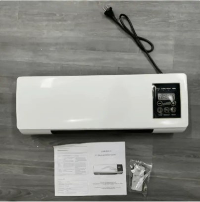 EpiCooler portable air conditioner unboxed on floor showing unit, power cable, user manual and mounting accessories