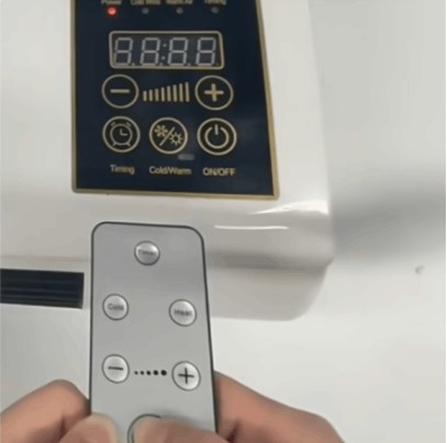EpiCooler portable air conditioner digital control panel and remote control closeup – timer, cold/warm and on/off buttons